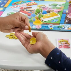 Hasbro Spiele & Puzzle Monopoly Junior Super Mario Edition Brettspiele Spiele Familie IP Security Lock - Release Date 31 March 2022 -Kaufland 386d85868ed56b9bd325c063d2fbb330